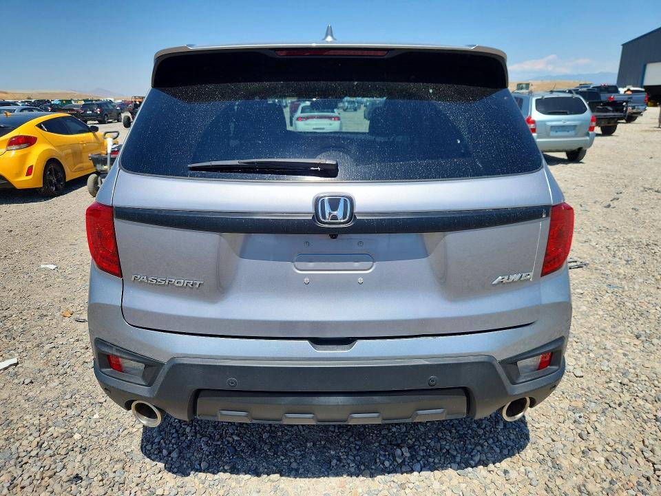 Photo 6 from auction – 2023 HONDA PASSPORT with VIN 5FNYF8H52PB032671