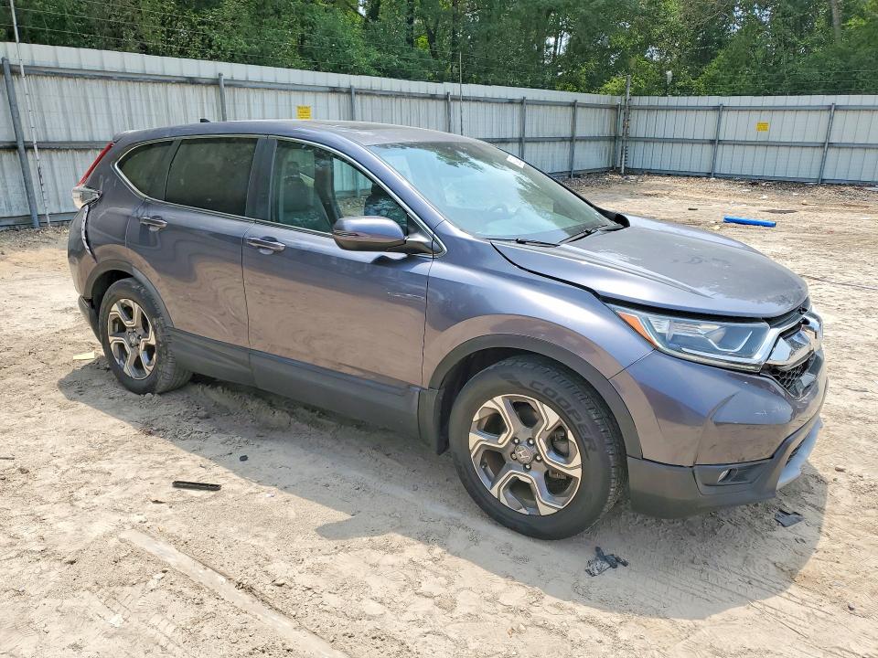 Photo 4 from auction – 2017 HONDA CR-V with VIN 5J6RW1H89HL001335