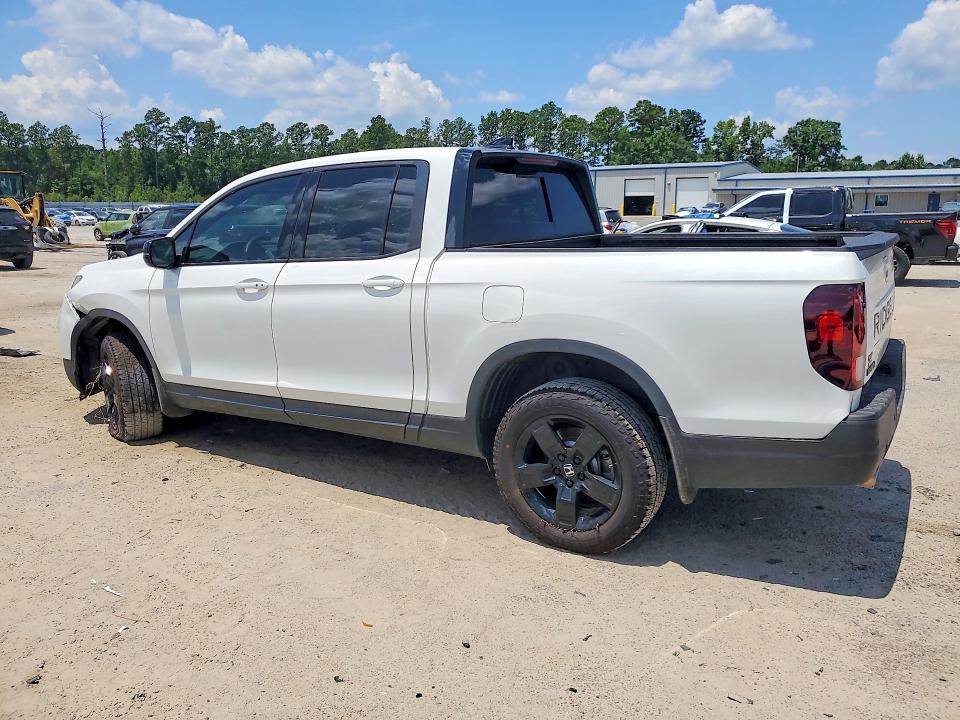 Photo 2 from auction – 2026 HONDA RIDGELINE with VIN 5FPYK3F91TB007136