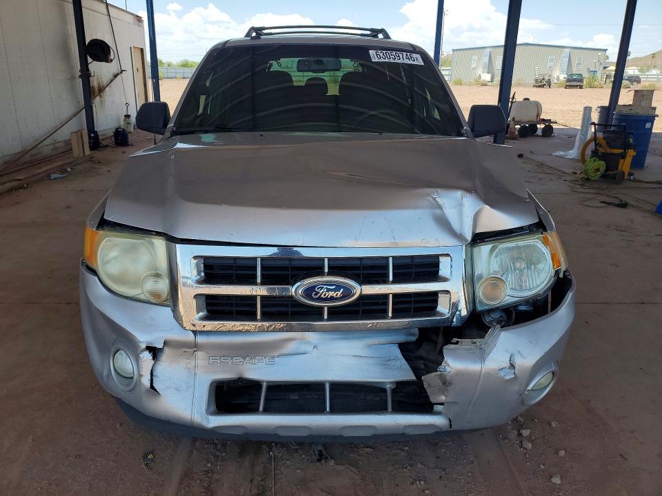 Photo 5 from auction – 2011 FORD ESCAPE with VIN 1FMCU0DG5BKA33555