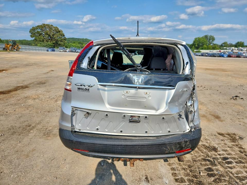 Photo 6 from auction – 2014 HONDA CR-V with VIN 2HKRM4H59EH638230