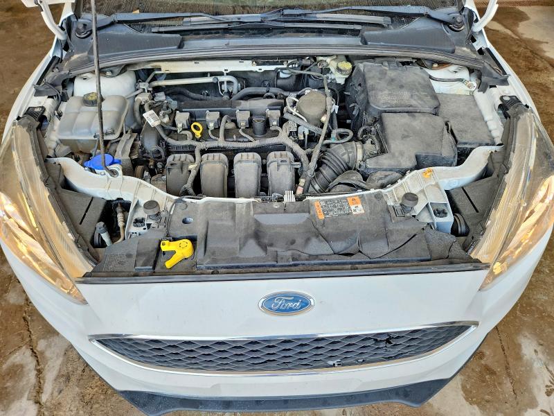 Photo 11 from auction – 2015 FORD FOCUS with VIN 1FADP3F21FL328810