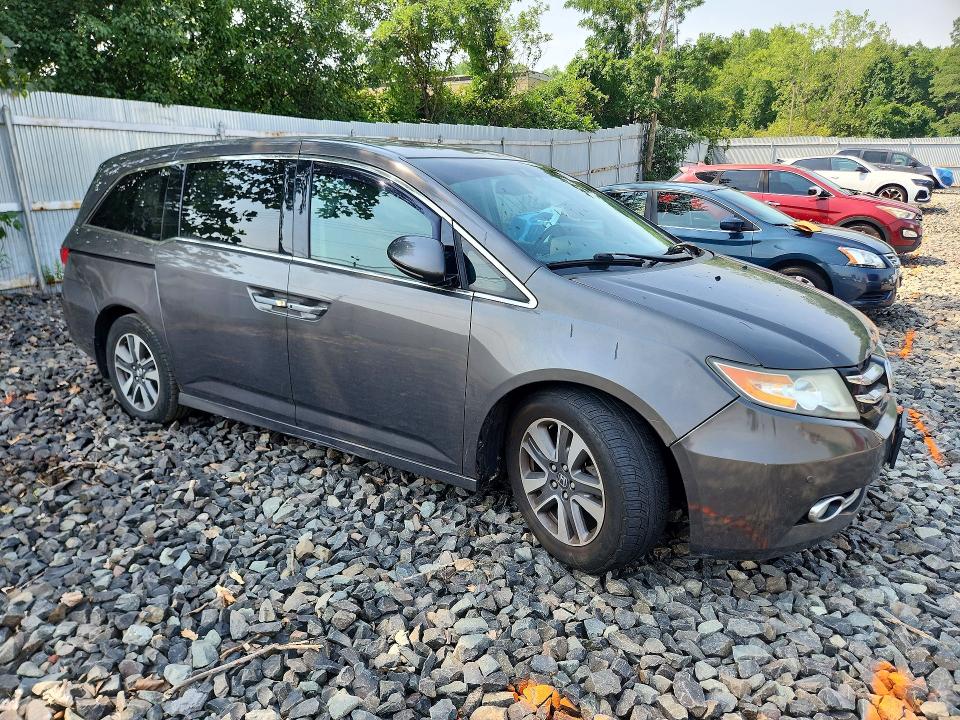 Photo 4 from auction – 2014 HONDA ODYSSEY with VIN 5FNRL5H99EB111640