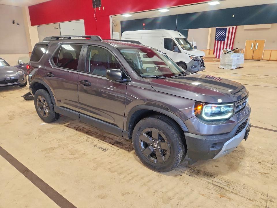 Photo 4 from auction – 2026 HONDA PASSPORT with VIN 5FNYF9H32TB021345