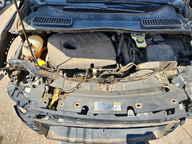 Photo 12 from auction – 2018 FORD ESCAPE with VIN 1FMCU9GD4JUA30977