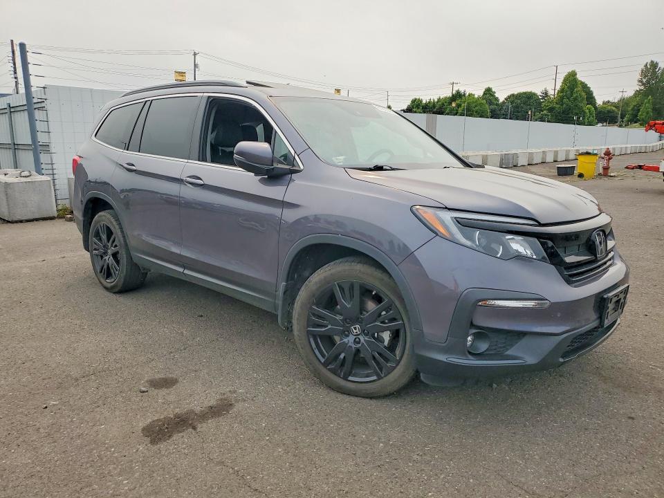 Photo 4 from auction – 2022 HONDA PILOT with VIN 5FNYF6H27NB041809