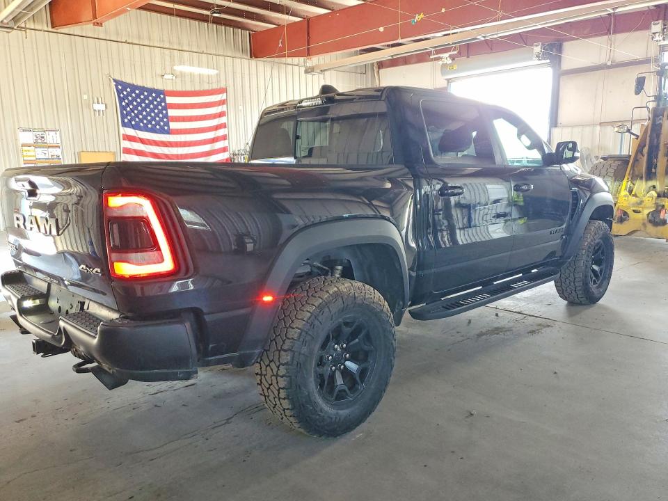 Photo 3 from auction – 2021 RAM 1500 with VIN 1C6SRFU90MN902898
