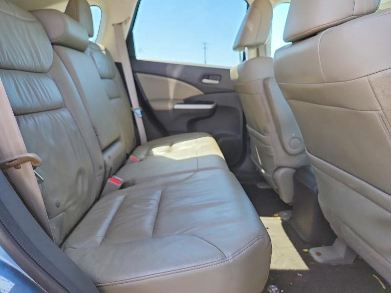 Photo 11 from auction – 2014 HONDA CR-V with VIN 2HKRM4H76EH705822