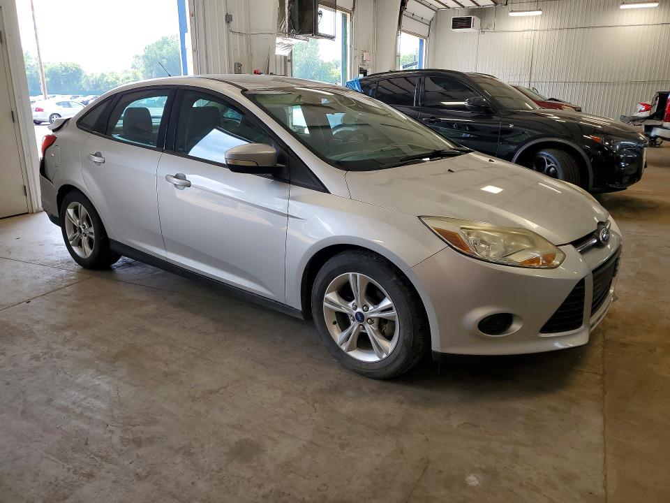 Photo 4 from auction – 2014 FORD FOCUS with VIN 1FADP3F28EL394110