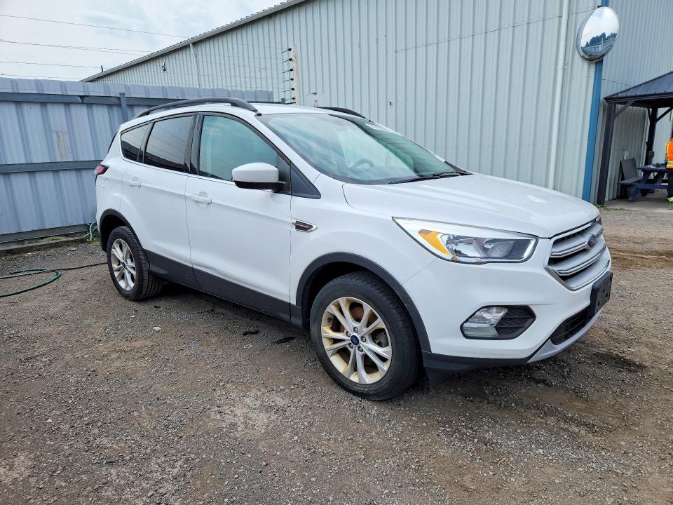 Photo 4 from auction – 2018 FORD ESCAPE with VIN 1FMCU9GD1JUB00421