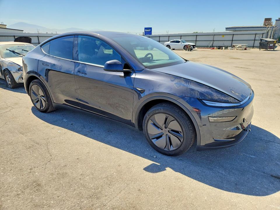 Photo 4 from auction – 2026 TESLA MODEL Y with VIN 7SAYGDED1TF660140