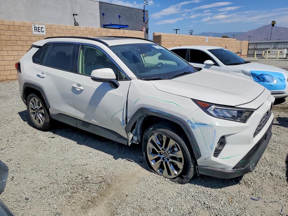 Photo 4 from auction – 2019 TOYOTA RAV4 with VIN JTMC1RFV6KD505909