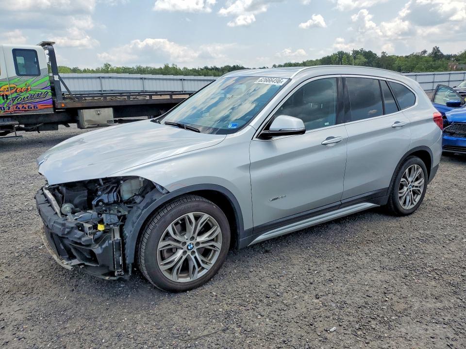 BMW X1 2017 with VIN WBXHT3Z31H4A57942 - Photo from auction