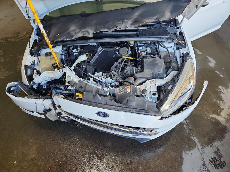 Photo 11 from auction – 2016 FORD FOCUS with VIN 1FADP3F2XGL267975