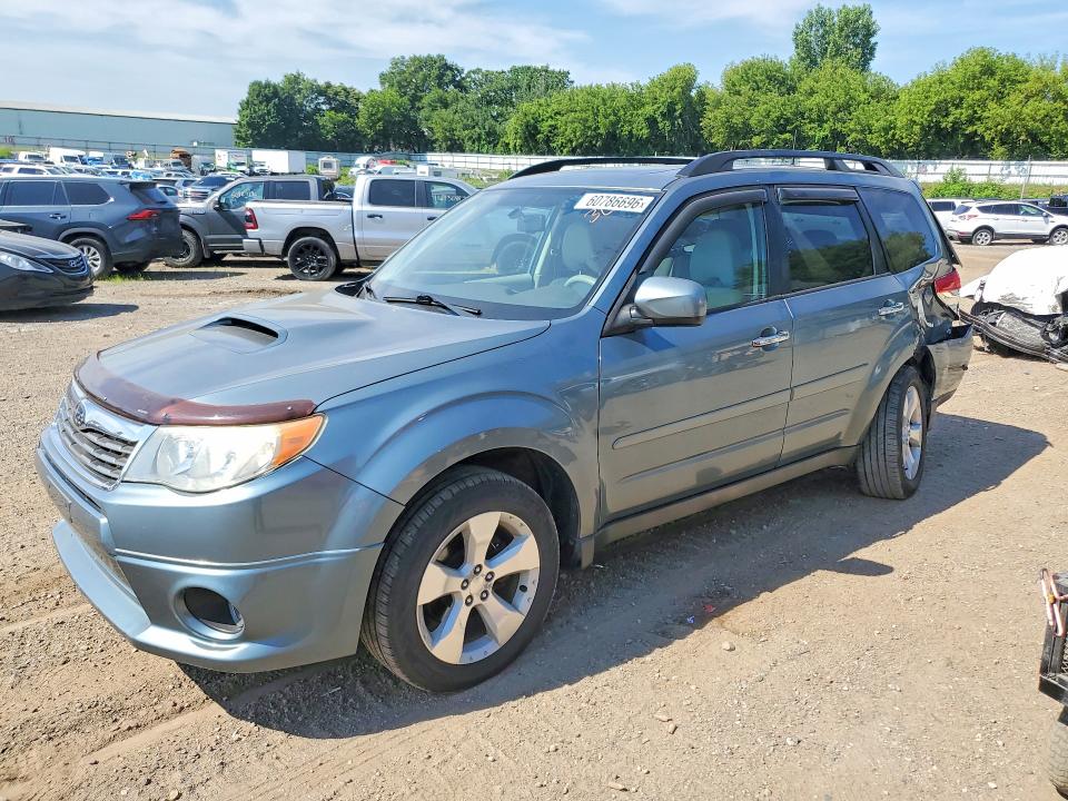 SUBARU FORESTER 2010 with VIN JF2SH6EC3AH763268 - Photo from auction