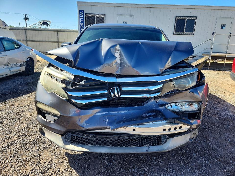 Photo 5 from auction – 2016 HONDA PILOT with VIN 5FNYF6H19GB094585