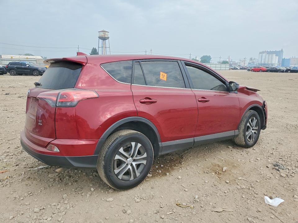 Photo 3 from auction – 2018 TOYOTA RAV4 with VIN 2T3BFREV2JW719523