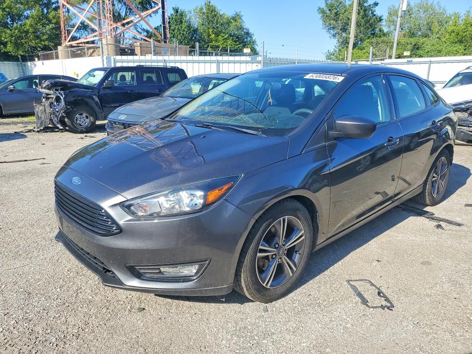 FORD FOCUS 2018 with VIN 1FADP3FE1JL330043 - Photo from auction