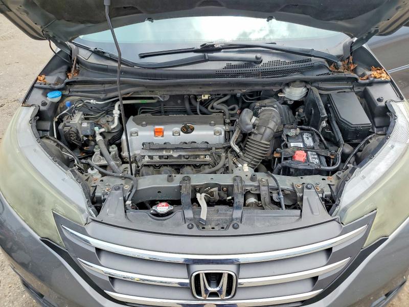 Photo 12 from auction – 2014 HONDA CR-V with VIN 2HKRM4H74EH655762