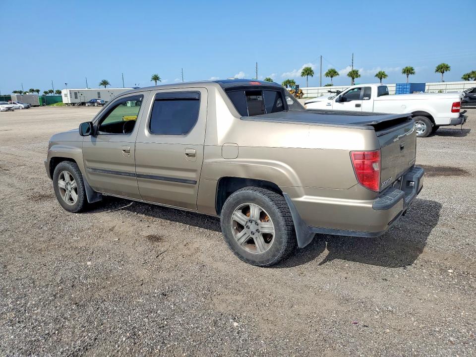 Photo 2 from auction – 2010 HONDA RIDGELINE with VIN 5FPYK1F57AB008516