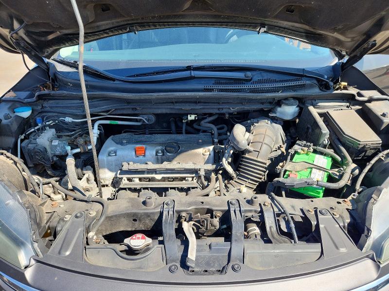 Photo 12 from auction – 2014 HONDA CR-V with VIN 5J6RM4H79EL063666