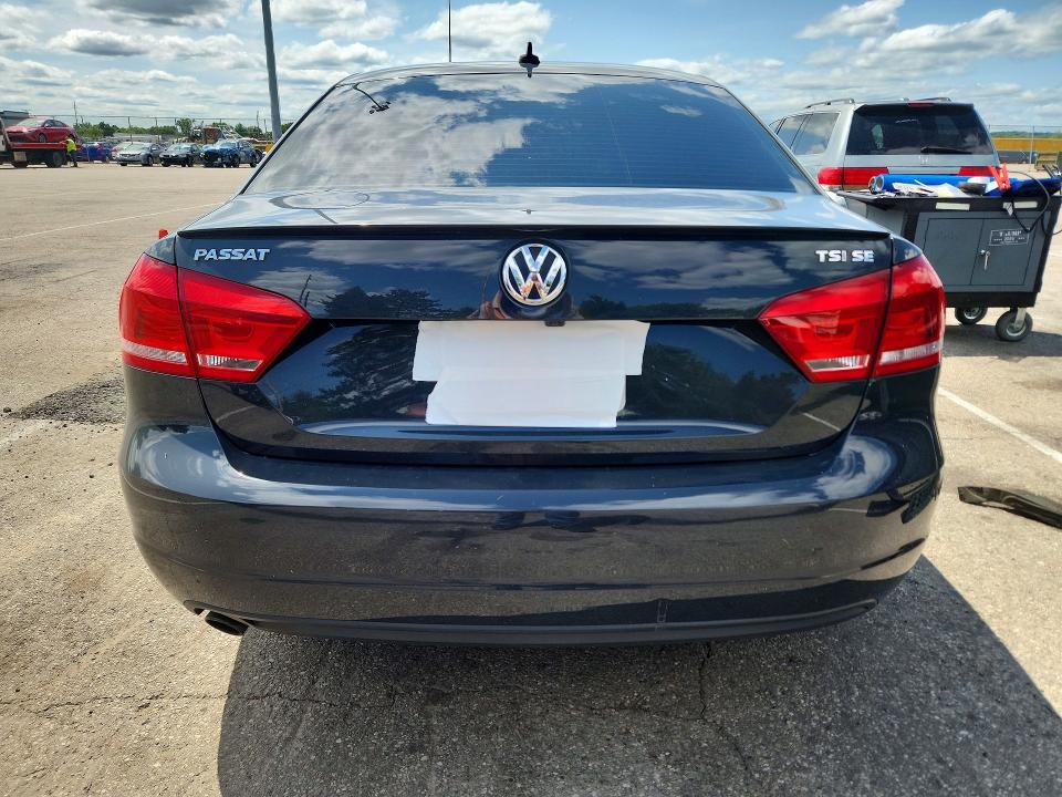Photo 6 from auction – 2015 VOLKSWAGEN PASSAT with VIN 1VWBT7A34FC072681
