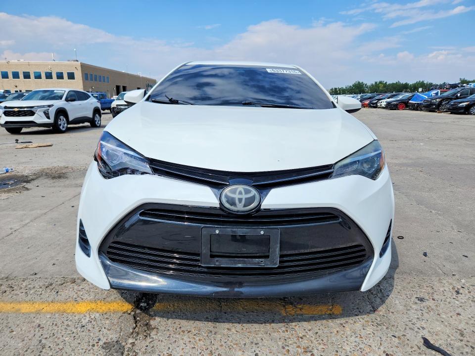Photo 5 from auction – 2018 TOYOTA COROLLA with VIN 5YFBURHEXJP816626
