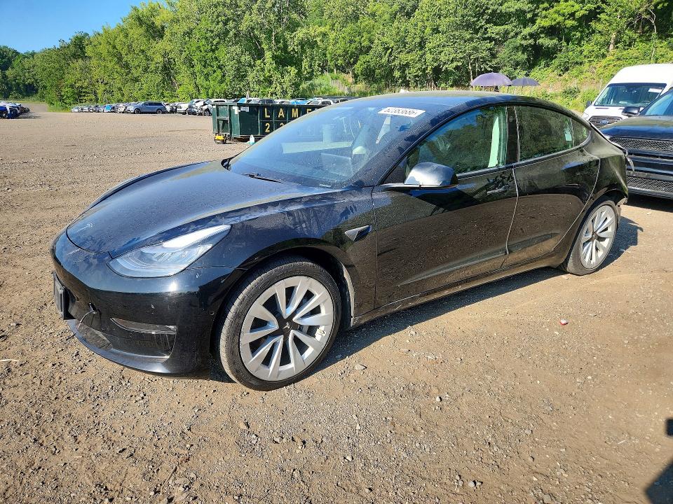 TESLA MODEL 3 2021 with VIN 5YJ3E1EB4MF859534 - Photo from auction