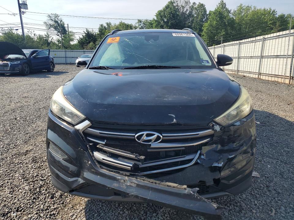 Photo 5 from auction – 2016 HYUNDAI TUCSON with VIN KM8J3CA27GU059042