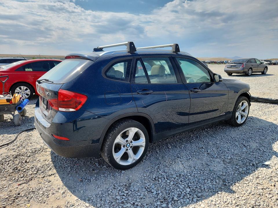 Foto 3 de la subasta – 2013 BMW X1 con VIN WBAVM5C52DVV90562
