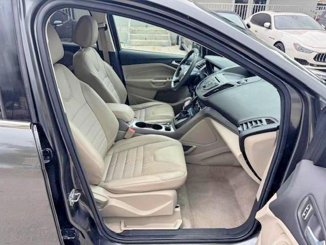 Photo 7 from auction – 2016 FORD ESCAPE with VIN 1FMCU0GX4GUC35892