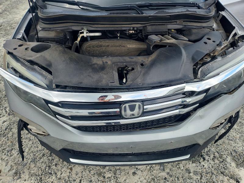 Photo 12 from auction – 2018 HONDA PILOT with VIN 5FNYF5H9XJB007865