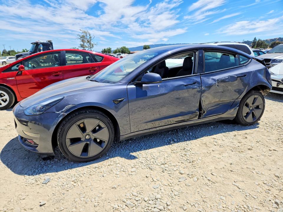 TESLA MODEL 3 2023 with VIN 5YJ3E1EAXPF693662 - Photo from auction