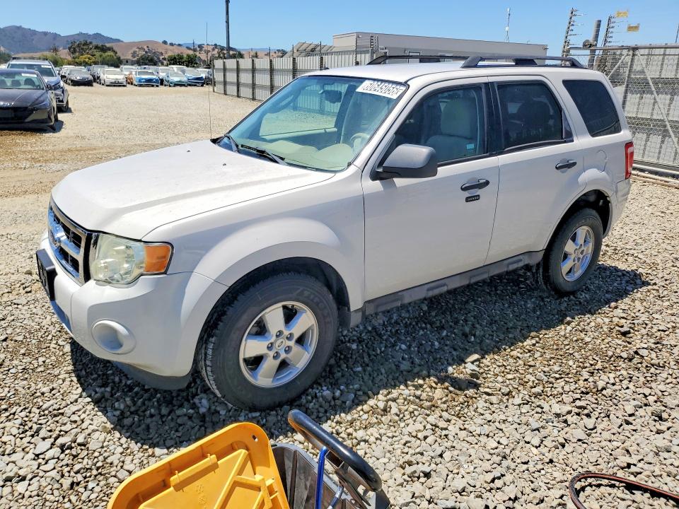 FORD ESCAPE 2009 with VIN 1FMCU03G19KA94980 - Photo from auction