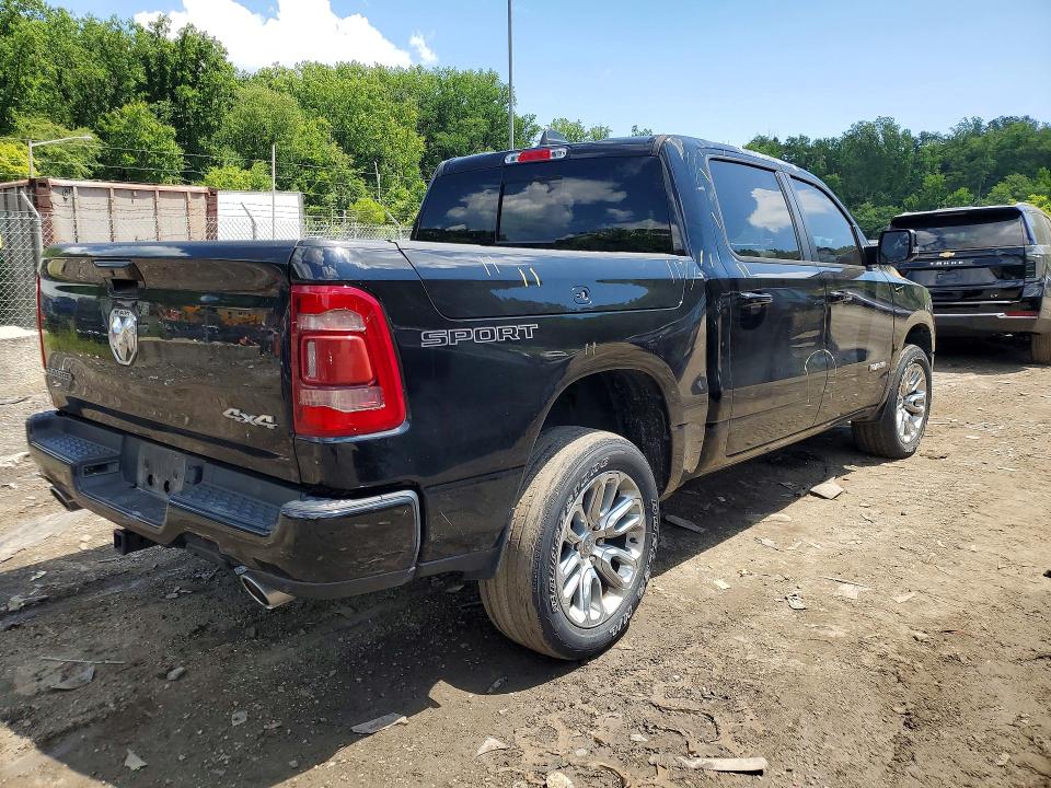 Photo 3 from auction – 2023 RAM 1500 with VIN 1C6SRFJT6PN602688