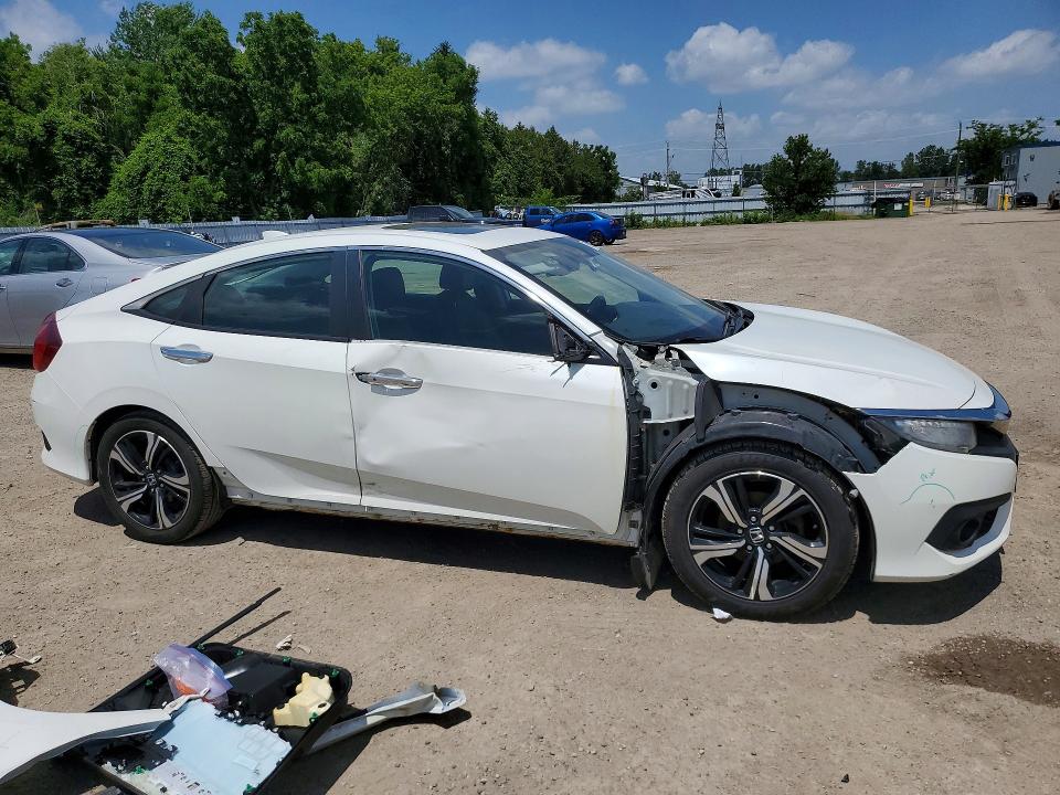 Photo 4 from auction – 2016 HONDA CIVIC with VIN 2HGFC1F92GH115025