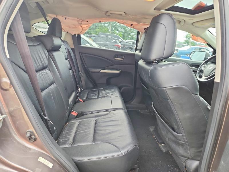 Photo 11 from auction – 2014 HONDA CR-V with VIN 2HKRM4H7XEH637296