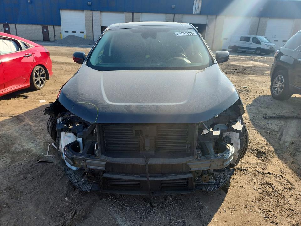 Photo 5 from auction – 2021 FORD EDGE with VIN 2FMPK4J91MBA33313