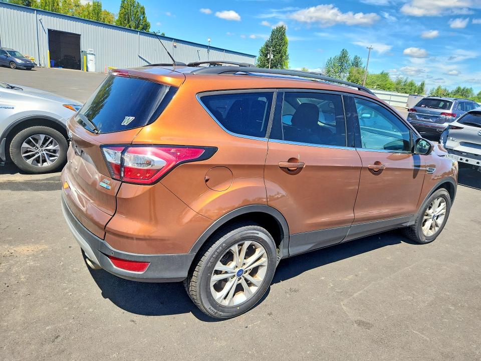 Photo 3 from auction – 2017 FORD ESCAPE with VIN 1FMCU9GDXHUE56151