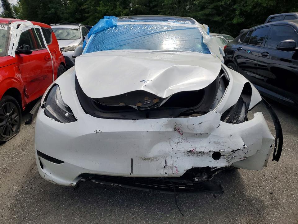 Photo 5 from auction – 2023 TESLA MODEL Y with VIN 7SAYGDEE6PF672573