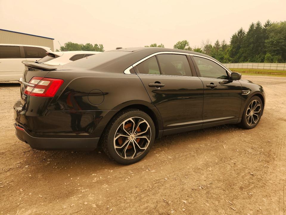 Photo 3 from auction – 2015 FORD TAURUS with VIN 1FAHP2KT7FG114262