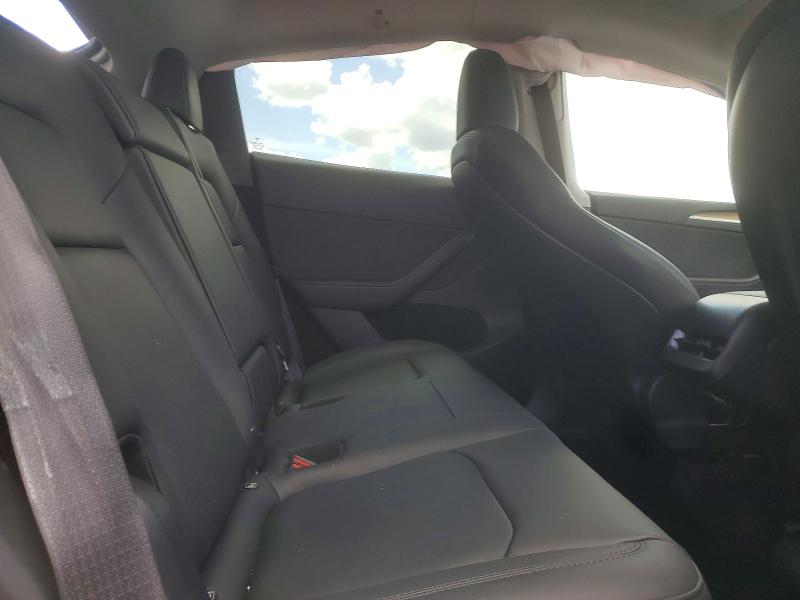 Photo 10 from auction – 2023 TESLA MODEL Y with VIN 7SAYGDEE2PA067656