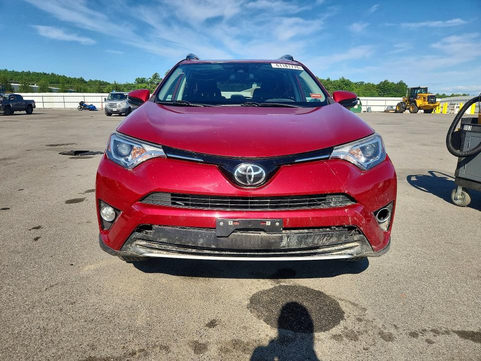 Photo 5 from auction – 2018 TOYOTA RAV4 with VIN 2T3RFREVXJW816533