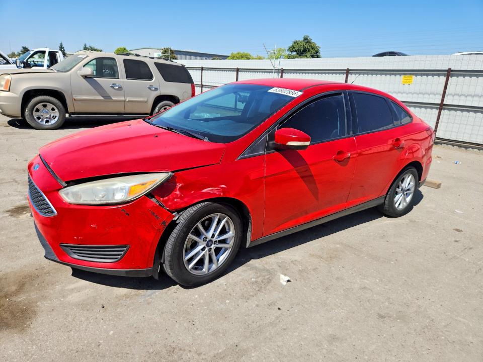 FORD FOCUS 2015 with VIN 1FADP3F26FL294511 - Photo from auction
