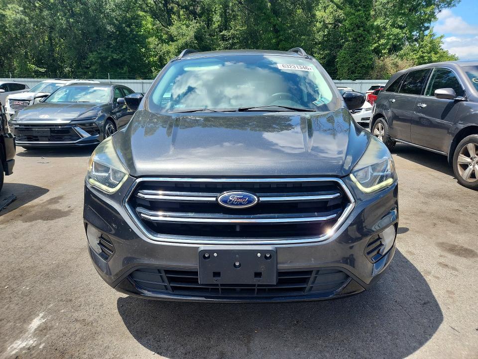 Photo 5 from auction – 2018 FORD ESCAPE with VIN 1FMCU9GD3JUA59709