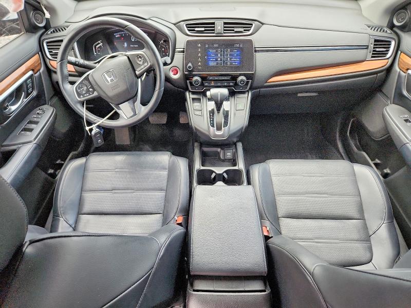 Photo 8 from auction – 2018 HONDA CR-V with VIN 7FARW1H91JE047334