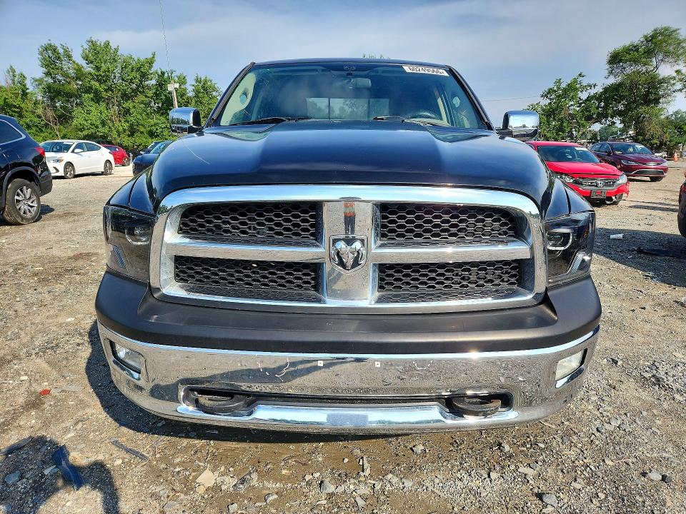 Photo 5 from auction – 2009 DODGE RAM 1500 with VIN 1D3HV18T19S702796