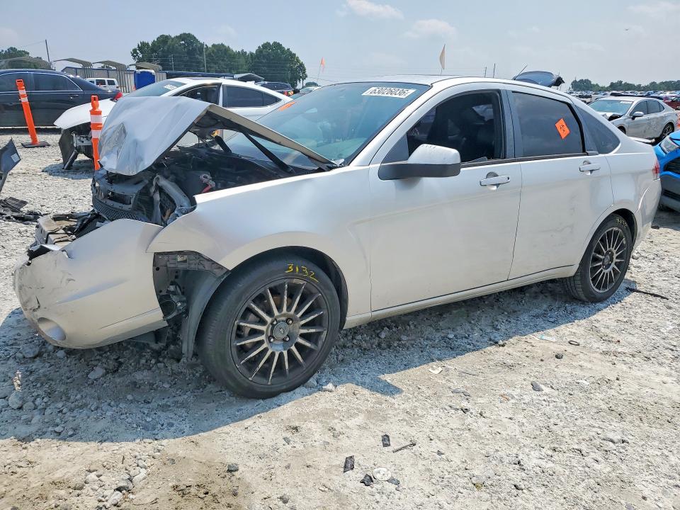 FORD FOCUS 2010 مع رقم تعريف المركبة 1FAHP3GNXAW258371 - صورة من المزاد