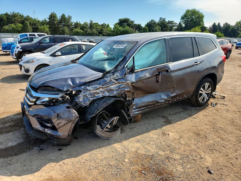 HONDA PILOT 2016 with VIN 5FNYF5H55GB023672 - Photo from auction