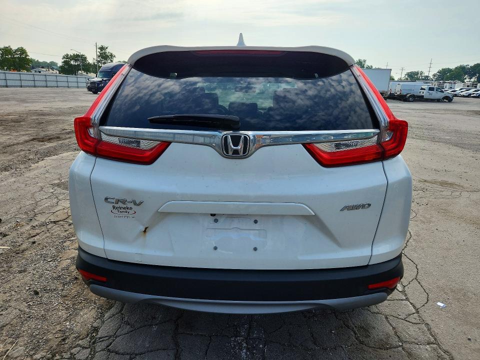 Photo 6 from auction – 2018 HONDA CR-V with VIN 5J6RW2H85JL013252